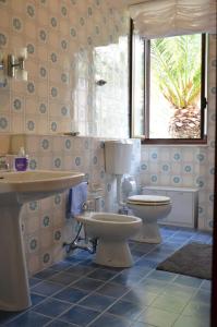 Een badkamer bij Villa Alchea Locazione Turistica