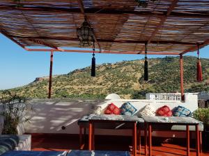Uma vista da montanha tirada do cama e café (B&B) 