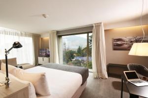 TV a/nebo společenská místnost v ubytování Solace Hotel Santiago