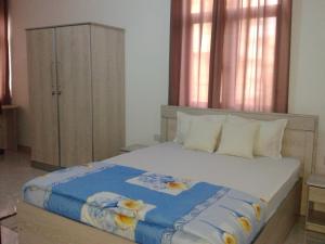 Postel nebo postele na pokoji v ubytování Happy Villa