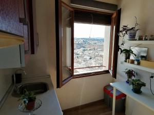 Kuchyň nebo kuchyňský kout v ubytování Apartamento PRANA Junto al Alcázar + 15 fotografií