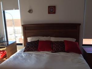 Rúm í herbergi á B&B Hostel CasaMoro