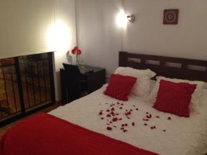 Rúm í herbergi á B&B Hostel CasaMoro