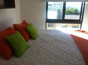 Rúm í herbergi á B&B Hostel CasaMoro
