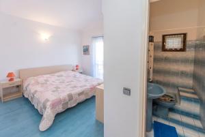 Postel nebo postele na pokoji v ubytování Apartment and Rooms Radojka