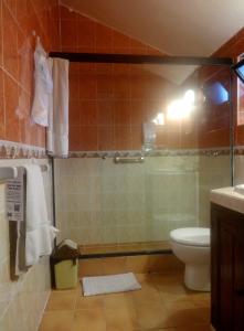 Un baño de El Hotel de Su Merced