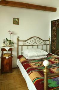 Cama o camas de una habitación en Dworek Łukowiska