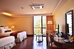 Voodi või voodid majutusasutuse Thunderbird Resorts - Rizal toas