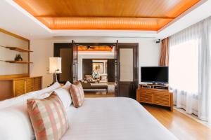 โทรทัศน์และ/หรือระบบความบันเทิงของ Trisara Villas & Residences Phuket