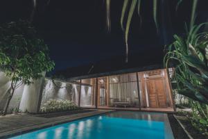 Πισίνα στο ή κοντά στο Ayom Java Village Solo