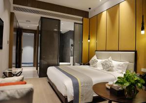 מיטה או מיטות בחדר ב-Prince Times Hotel