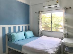 Postel nebo postele na pokoji v ubytování Tourist Inn