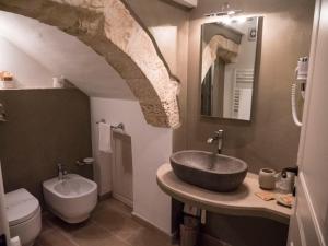 Koupelna v ubytování Terrazza Sui Trulli