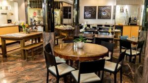 Restorāns vai citas vietas, kur ieturēt maltīti, naktsmītnē Hotel Rivoli Jardin