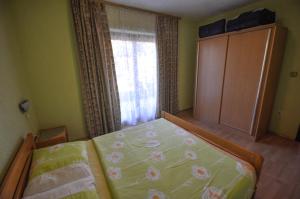 Łóżko lub łóżka w pokoju w obiekcie Jurica Apartments