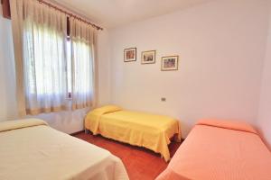 Posteľ alebo postele v izbe v ubytovaní Villa Sara Marisa + 7 fotografií