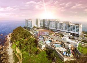 an aerial view of a resort with a water park at Lotte Resort Sokcho in Sokcho