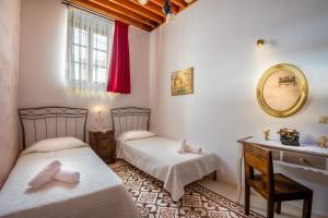 A bed or beds in a room at Villa Amalia