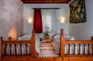 A bed or beds in a room at Villa Amalia