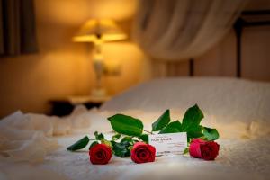 A bed or beds in a room at Villa Amalia