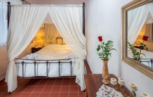 A bed or beds in a room at Villa Amalia