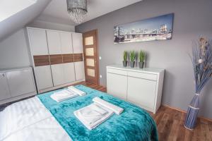 Posteľ alebo postele v izbe v ubytovaní Rubin Relax Apartman + 20 fotografií