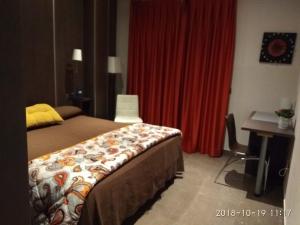 Postel nebo postele na pokoji v ubytování Hostal Alcalá Del Jucar