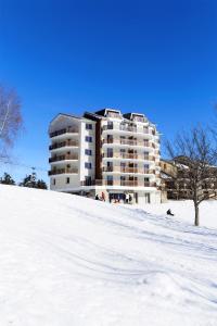 Résidence Néméa Les Balcons d'Ax v zimě