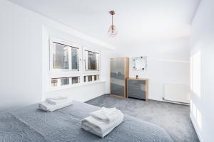 Tempat tidur dalam kamar di Casa Fresa - Castlehill Apartment