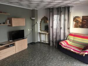 Televízia a/alebo spoločenská miestnosť v ubytovaní SPLENDIDE F4 ALICANTE Santa Pola