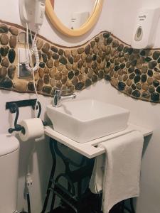 オストルダにあるAusteriaのバスルーム(洗面台、鏡付)