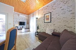 TV a/nebo společenská místnost v ubytování Lovely apartment Silvana