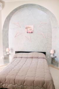 Postel nebo postele na pokoji v ubytování C era Una Volta