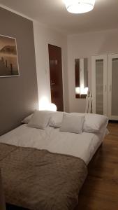 Postel nebo postele na pokoji v ubytování Pokoje gościnne Venezia