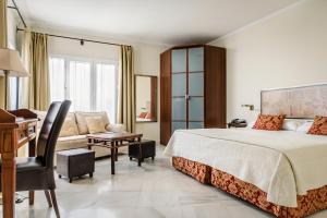Postel nebo postele na pokoji v ubytování Hotel YIT Casa Grande