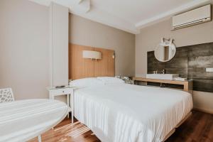 Postel nebo postele na pokoji v ubytování Hotel Isasa