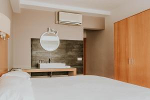 Postel nebo postele na pokoji v ubytování Hotel Isasa