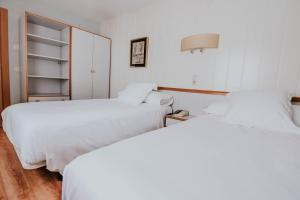 Postel nebo postele na pokoji v ubytování Hotel Isasa