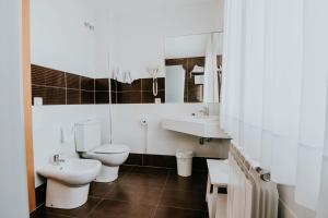 Koupelna v ubytování Hotel Isasa
