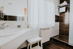 Koupelna v ubytování Hotel Isasa