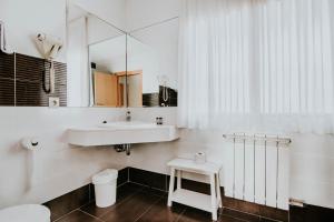 Koupelna v ubytování Hotel Isasa