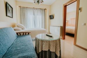 Postel nebo postele na pokoji v ubytování Hotel Isasa