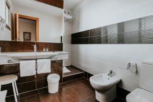 Koupelna v ubytování Hotel Isasa