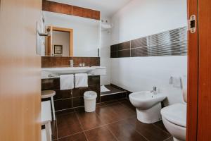 Koupelna v ubytování Hotel Isasa