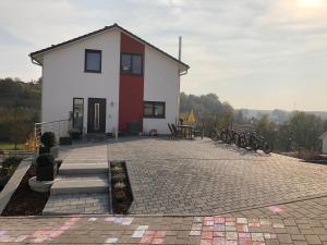 a house with bikes parked in front of it at Ferienwohnung Janson in Wiesenbach