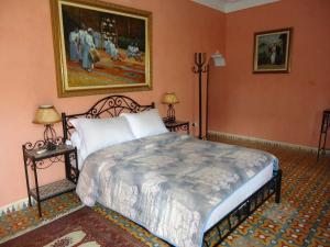 Postel nebo postele na pokoji v ubytování Hotel Riad L' Arganier D' Or + 37 fotografií