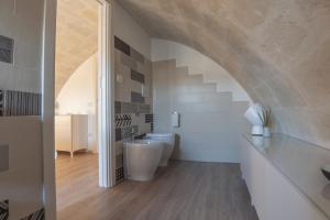 A bed or beds in a room at LAMIA MATERA 11