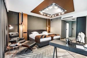 Posteľ alebo postele v izbe v ubytovaní Hotel Traugutta3