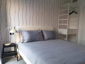 Posteľ alebo postele v izbe v ubytovaní Adam Apartment