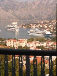 a view of a harbor with two cruise ships in the water at Beautiful view in Kotor